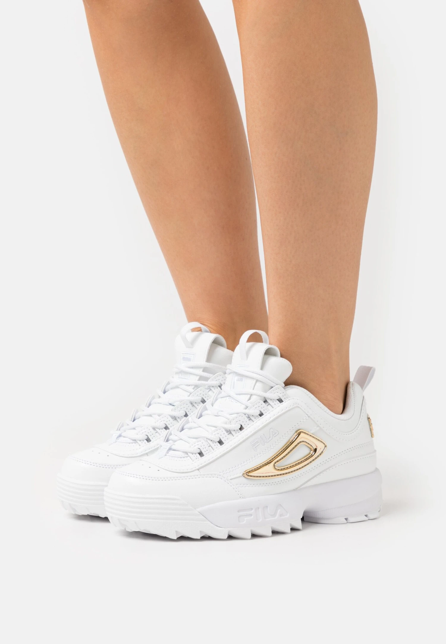 Fila Disruptor M Wmn - Baskets Basses - White/Gold 1 Fila Disruptor M Wmn - Baskets Basses - White/Gold