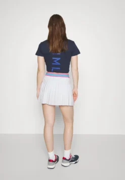 Fila Skort Finja - Jupe Plissée - White -Magasin De Mode Et De Sport a18994200a594f58862cbe744198c1cd scaled