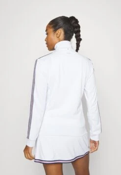 Fila Jacket Olivia - Veste De Survêtement - White 9 Fila Jacket Olivia - Veste De Survêtement - White -Magasin De Mode Et De Sport e6dd364fd6724bcf89a80be63de0cbbc scaled